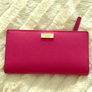 Kate Spade hot pink large wallet with snap closure