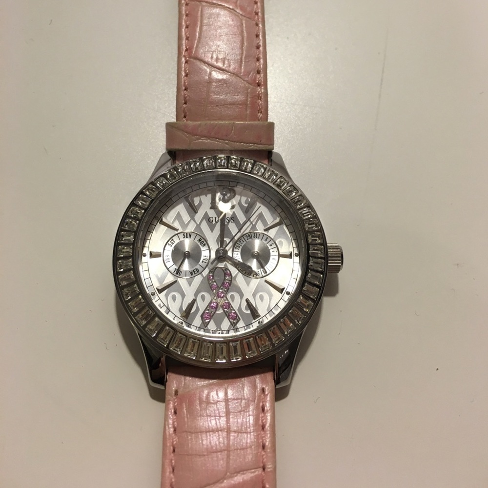 Guess pink watch used. No scratches.