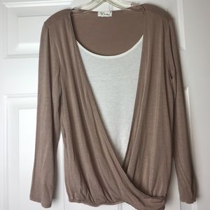 Long sleeved beige/nude layered top with cream.