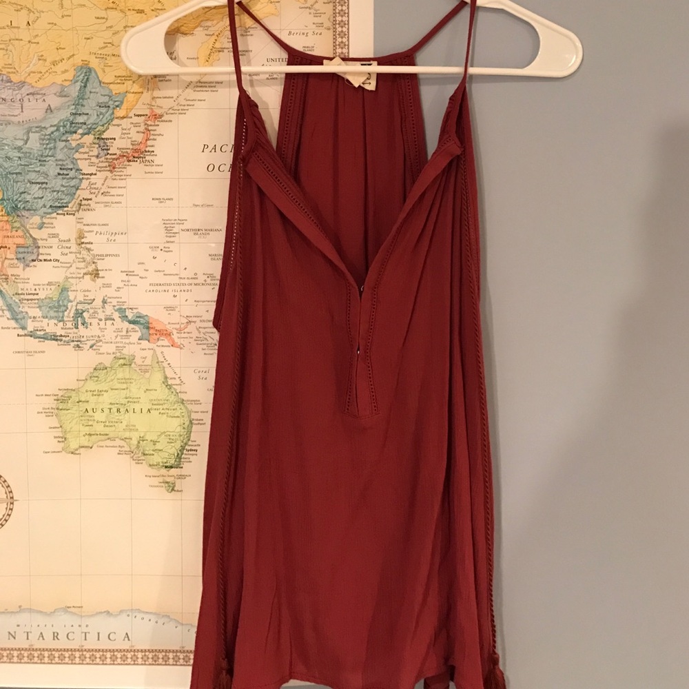 Dark red/orange/maroon shirt