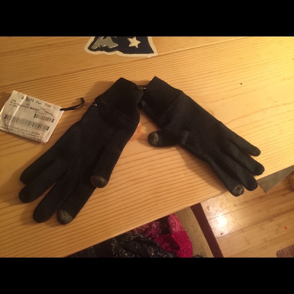 A pair of lulu lemon gloves