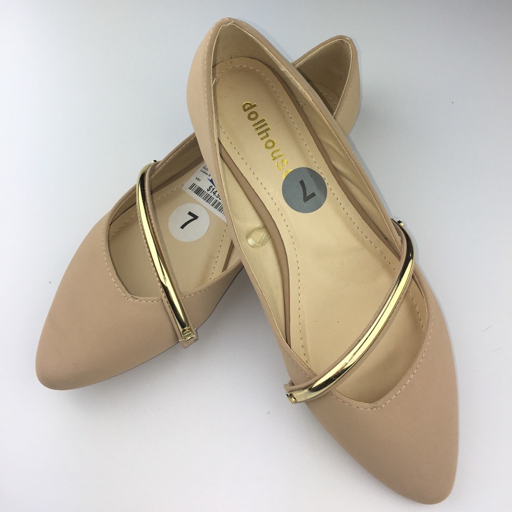 NWT Nude color, size 7 flats, gold plastic strap.