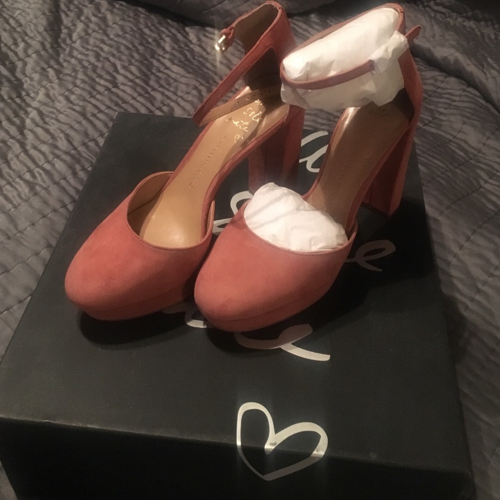 Never worn blush platform heels