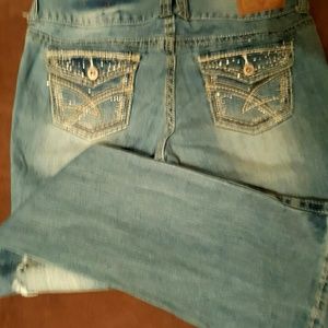 Amethyst ripped jeans.  Inseam 32"