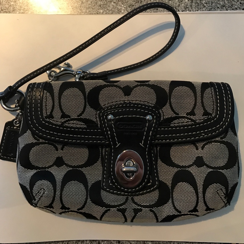 Coach turn lock wristlet