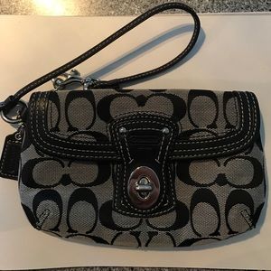 Coach turn lock wristlet