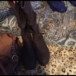 Brown and gold boots