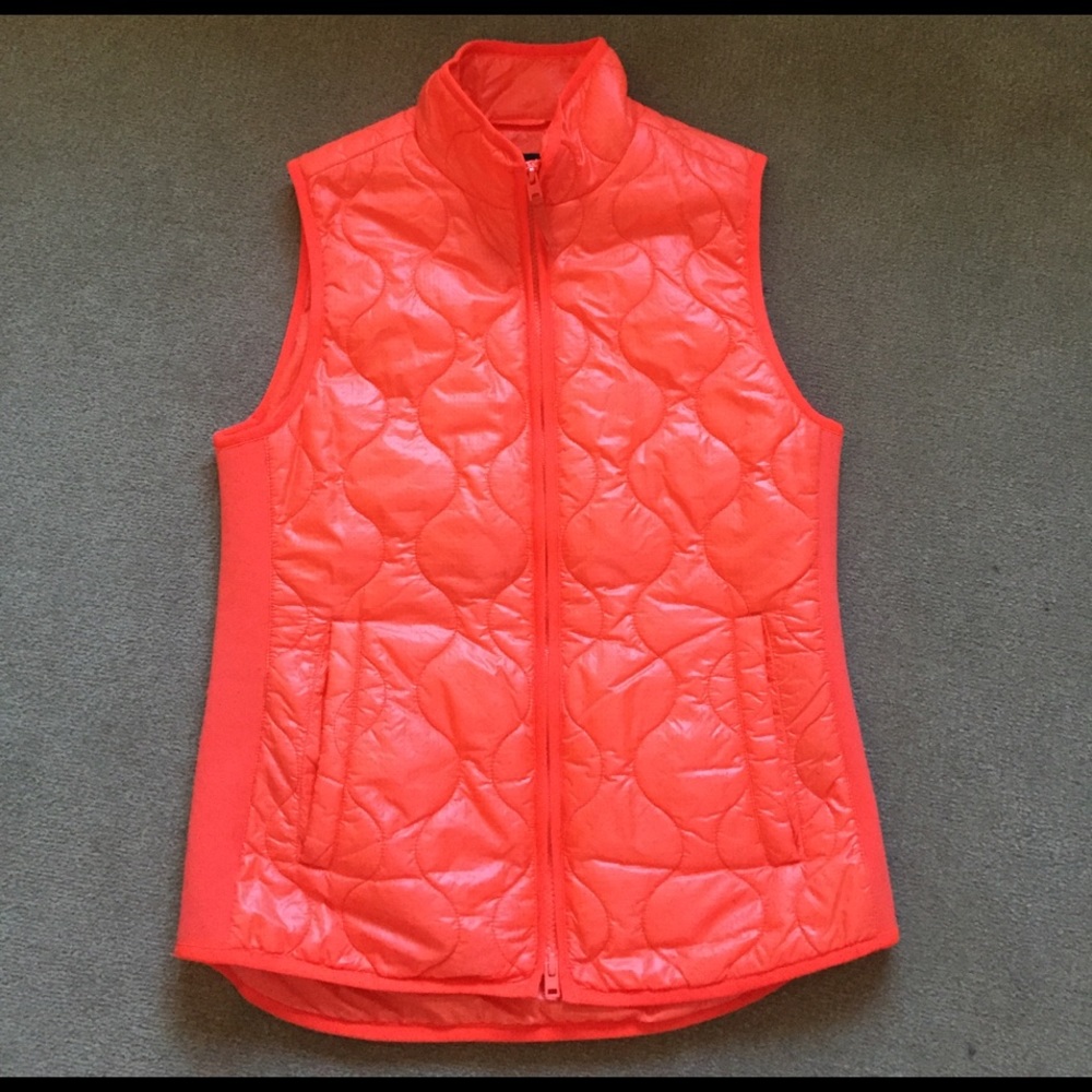 J. Crew neon orange light puffer vest.
