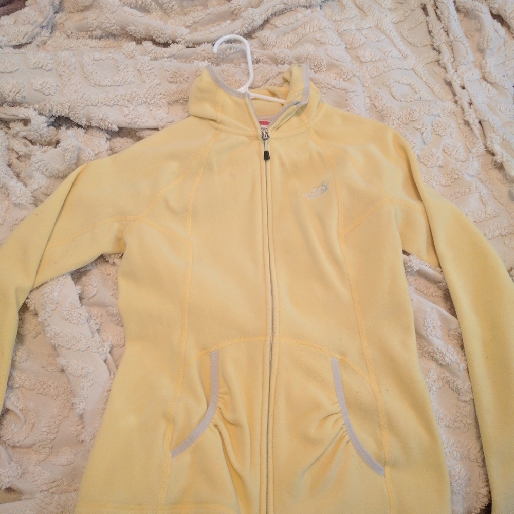 Small yellow North Face zip up