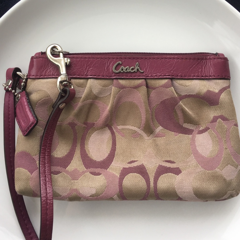 Coach pink and tan wristlet purse