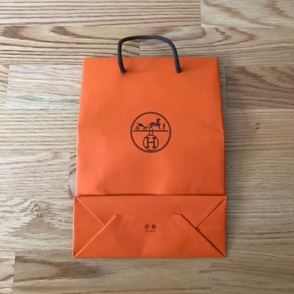 Hermes orange paper bag approx 8.25 x  11.5