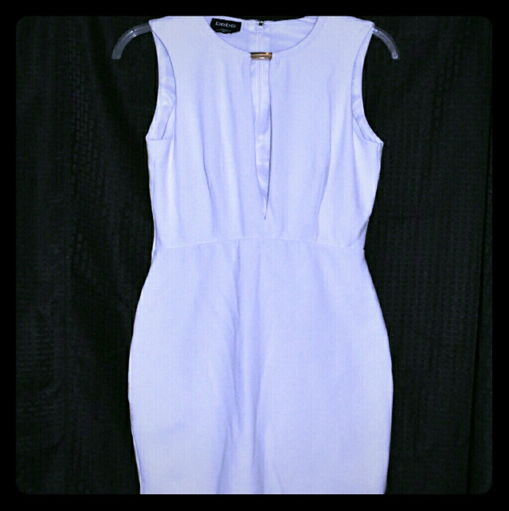 Deep V White bebe dress! Make an offer!