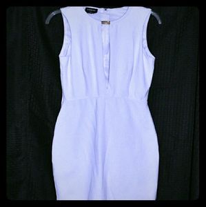 Deep V White bebe dress! Make an offer!