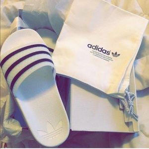 Size 7 women's adilette slides.