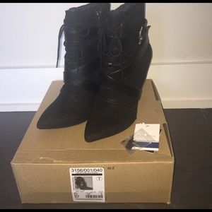 Lace-up high heeled bootie