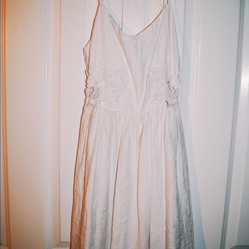 White dress with crochet side detailing