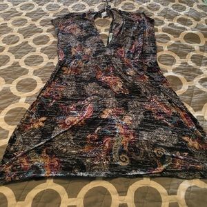 V neck sleeveless shirt.