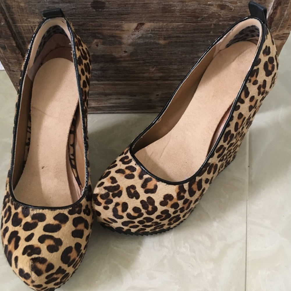 Leopard wedge heels.