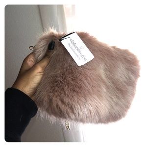 Mauve furry clutch
