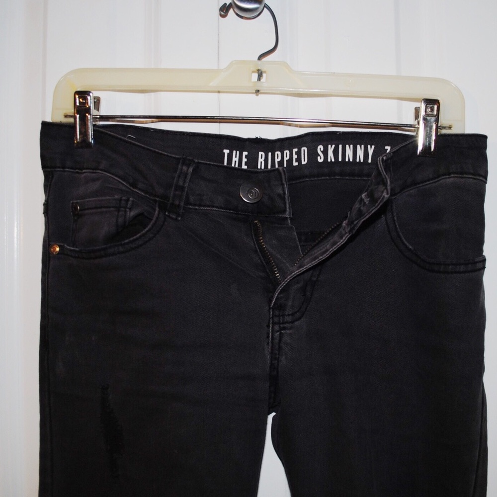 Ripped charcoal grey skinny jeans