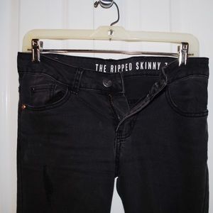 Ripped charcoal grey skinny jeans