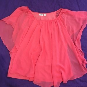 Coral colored flowery spring blouse