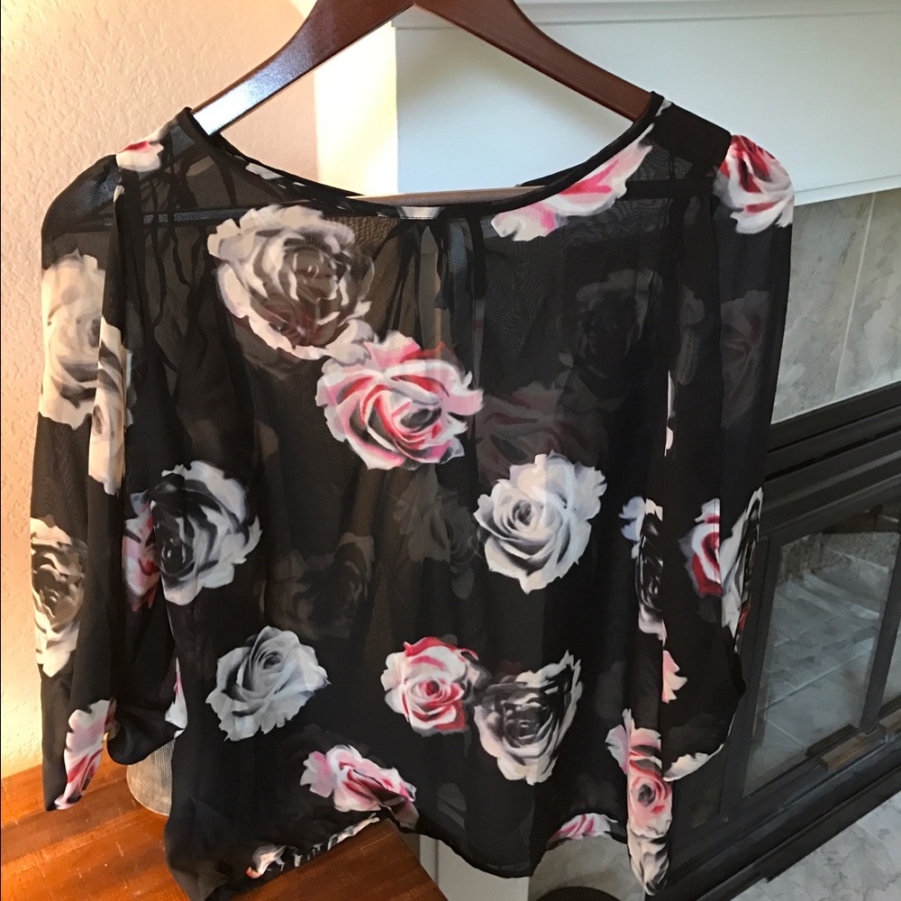 Sheer floral top.