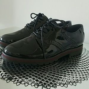 Black patent leather Oxfords