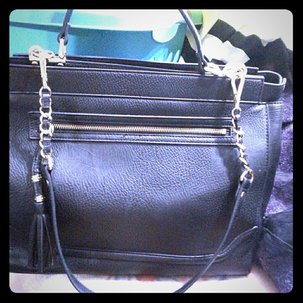 Olivia+Joy satchel and shiukder bag with strap.