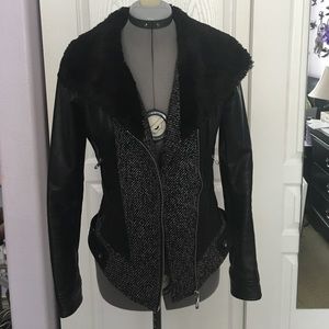 Guess Leather with fur collar and wool front.