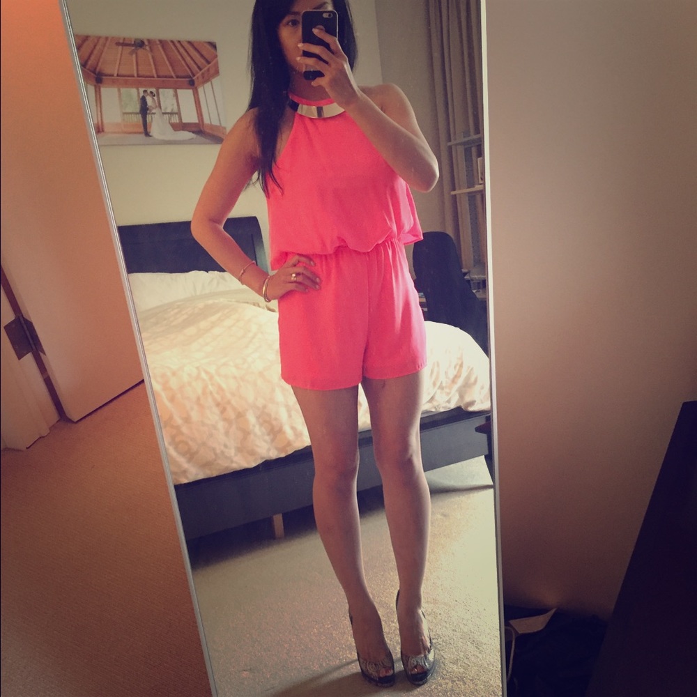 Neon pink romper with gold neck piece! 🌟