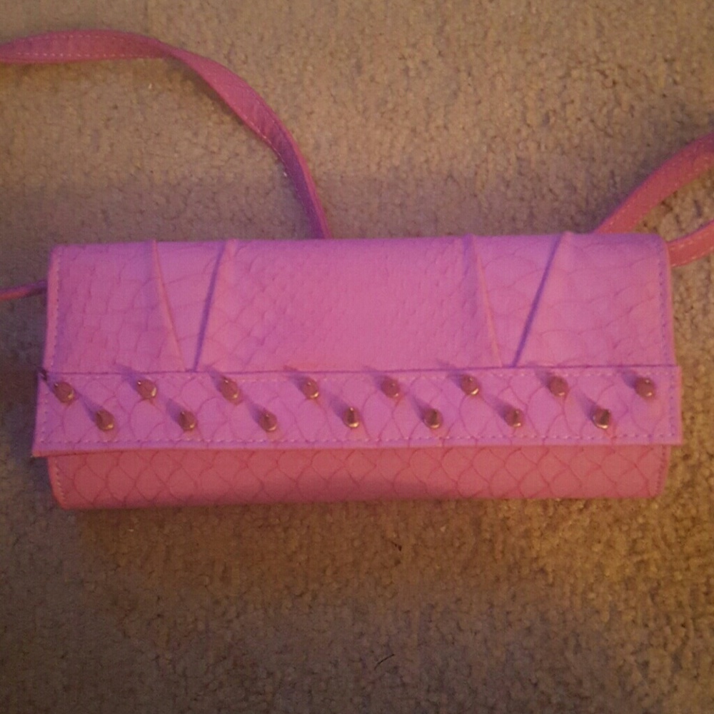 Pink faux alligator skin spiked clutch purse