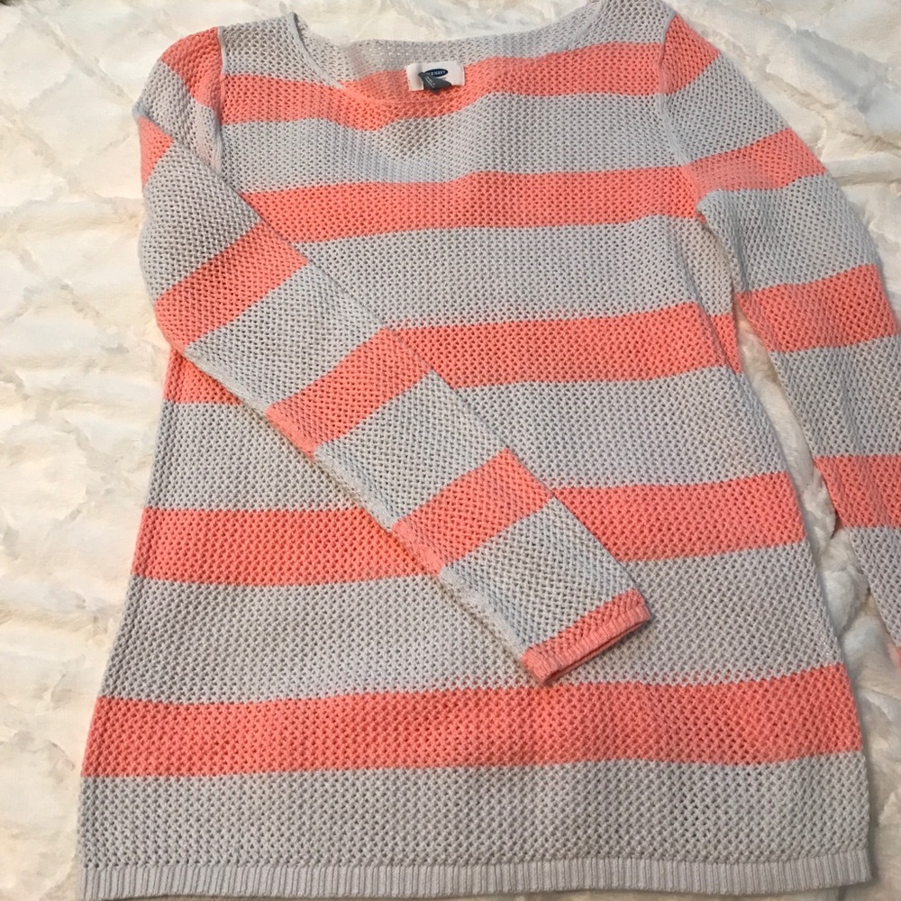 Coral and tan striped sweater.