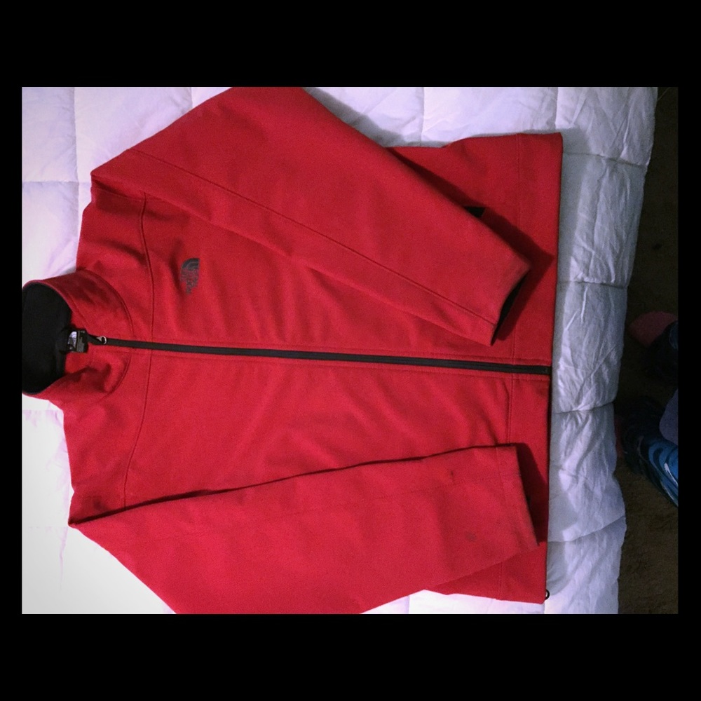 Men's red North Face jacket in size large
