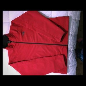 Men's red North Face jacket in size large
