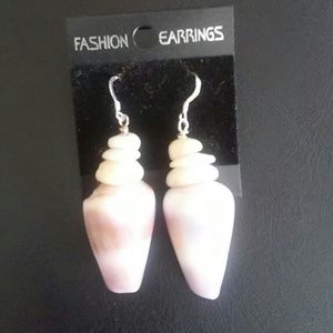 Handmade cone shell earrings with puka shell