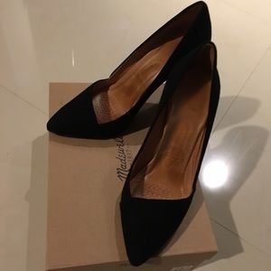 Black high heels in suede