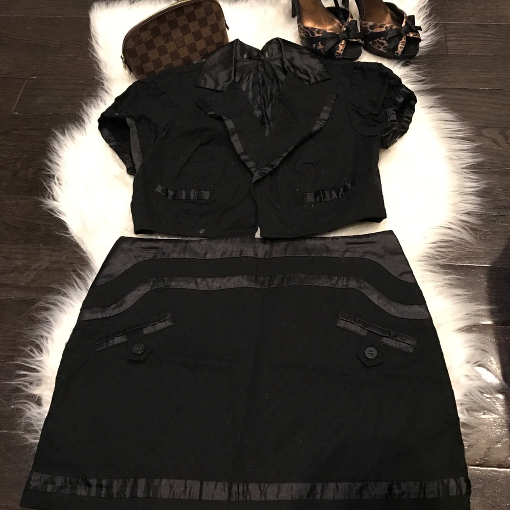 Mini skirt and short sleeved blazer jacket