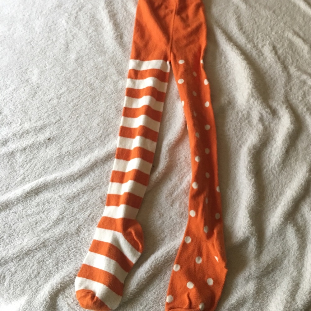 Orange and white striped and polka dot knit tights