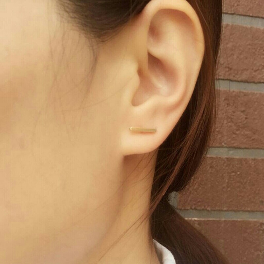 Trendy tiny gold bar earrings