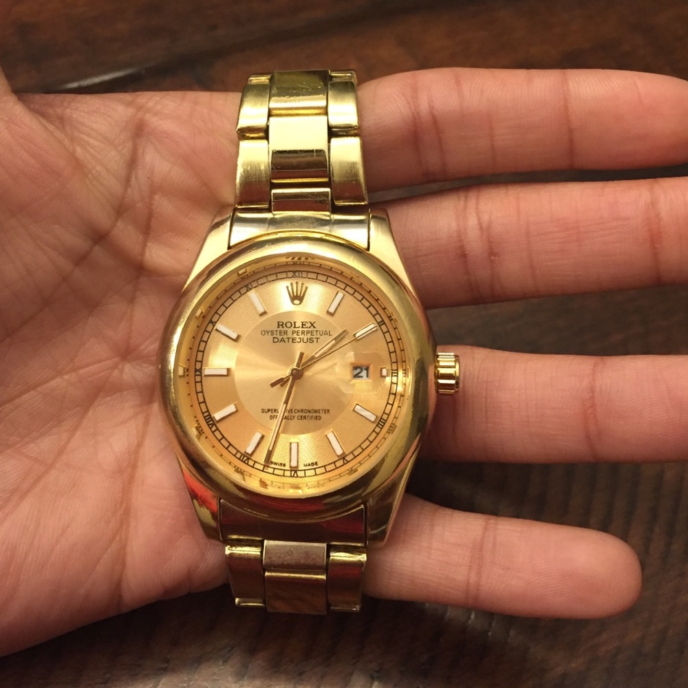A new Rolex oyster perpetual date non authentic