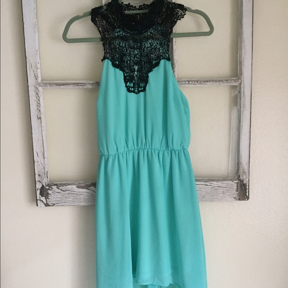 Turquoise dress with black crochet detail