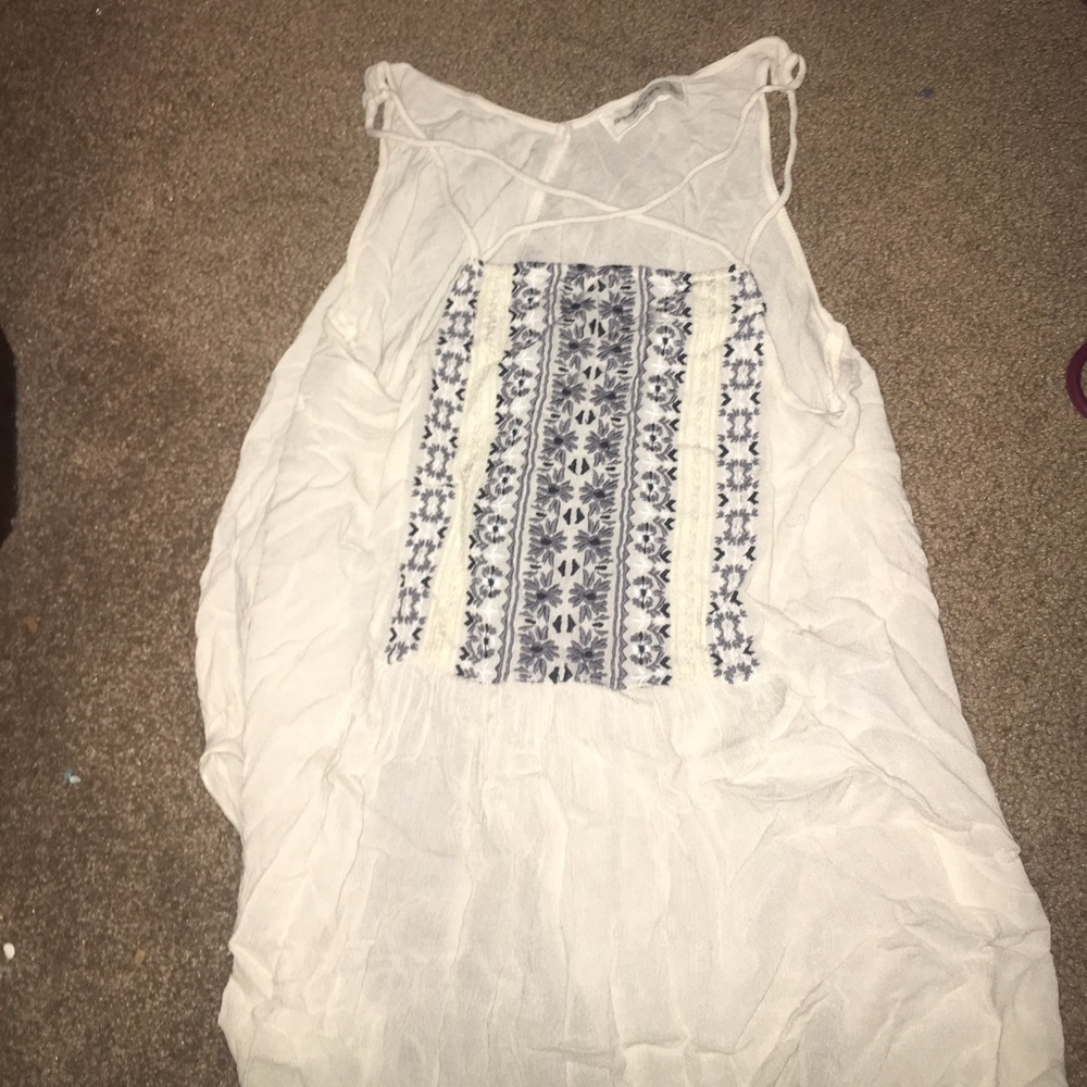 white tank with blue detailing