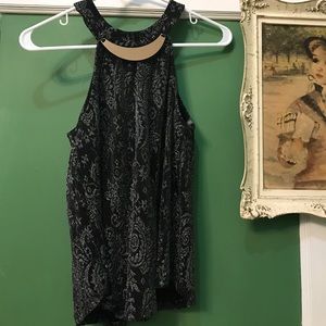 Sleeveless metallic top