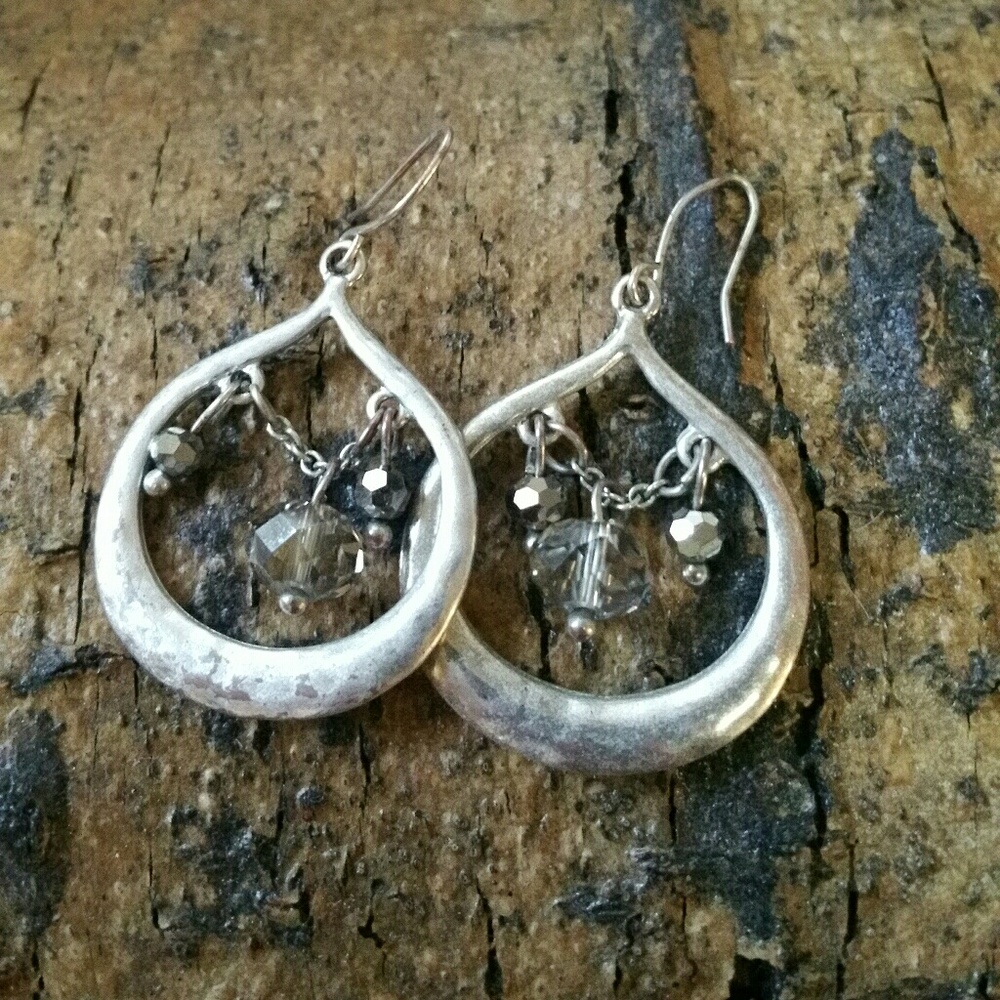 Silver tone earrings with stones