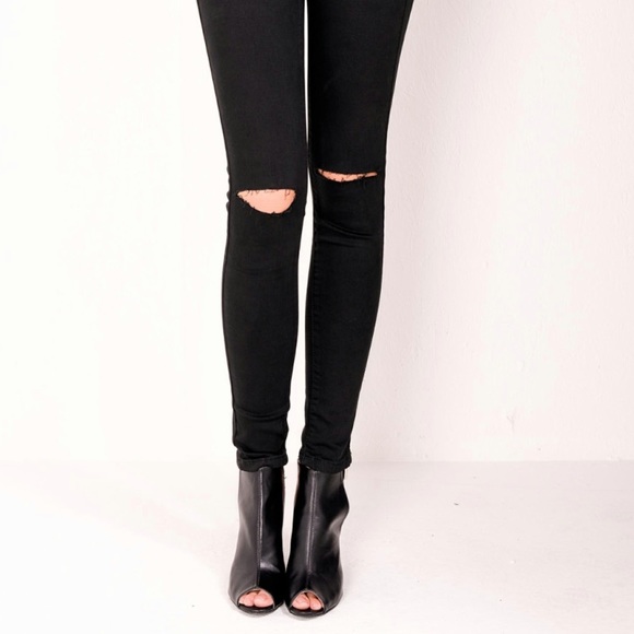 Urban Outfitters Pants - Black stretchy jeans with distressed knee NWT