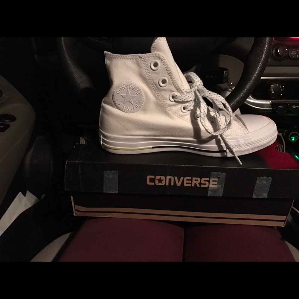 Brand new. Never used Converse sneakers