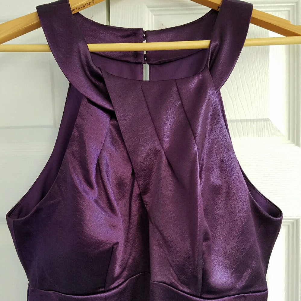 NWOT. Dress Barn Purple Dress. Intricate front.