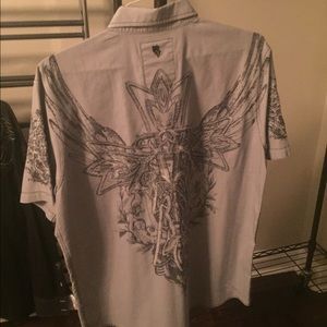 Roar from buckle. Short sleeve buttonup