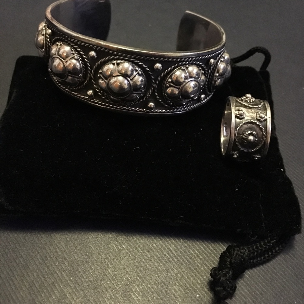 Navajo silver cuff bracelet and ring with details.